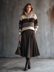 Ensemble pull zippé et jupe plissée — vue en pied.