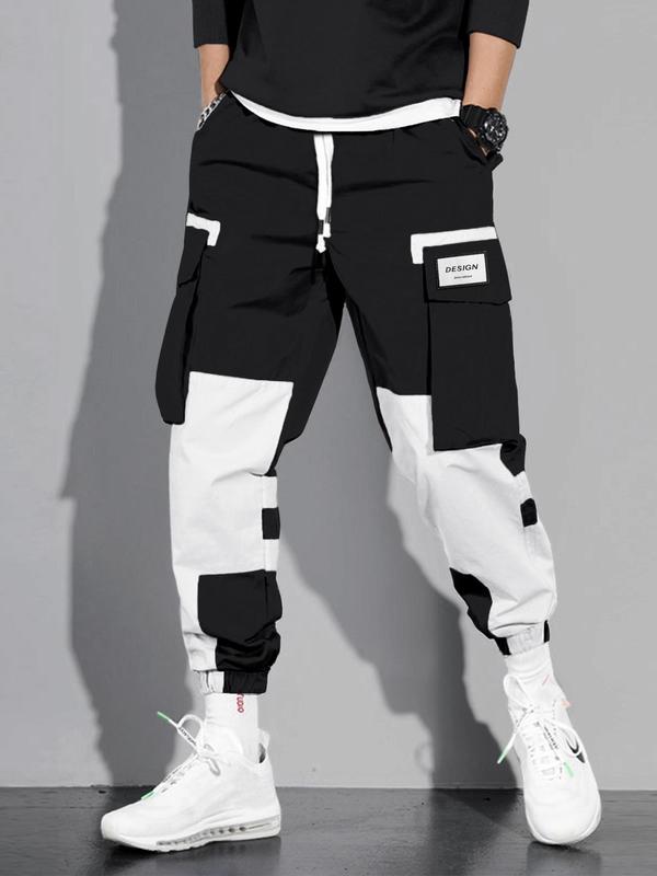 Pantalon cargo contrastes couleurs noir et blanc — vue portée en pied