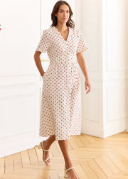 Robe crème à pois rouges