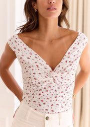 Top fleuri maille pointelle col V