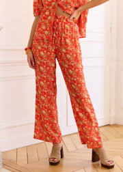 Pantalon rouge fleuri fluide