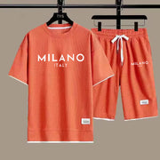 Ensemble short à imprimé Milano — orange corail sur cintre, short imprimé