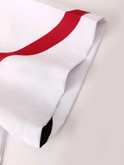 Ensemble polo short taille élastique — détail poignet de manche et ligne ondulée rouge