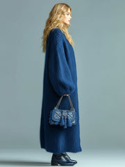Gilet long ample boutonné bleu marine — vue portée de profil