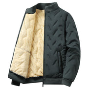 Blouson sombre à nuance vert-gris, ouvert sur un intérieur clair.