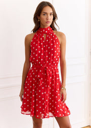 Robe rouge à pois blancs