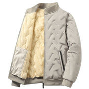 Blouson beige grisé à col montant, ouvert sur un intérieur clair duveteux.