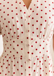 Robe crème à pois rouges