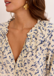 Blouse blanche fleurie bleue lien col