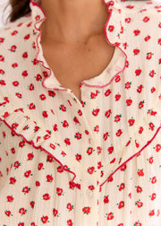 Chemise beige fleurie rouge