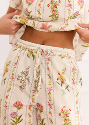 Pantalon ample beige fleuri en coton