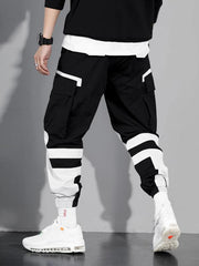 Pantalon cargo contrastes couleurs noir et blanc — vue portée en pied, de dos