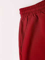 Ensemble polo short taille élastique — détail tissu du short et poche latérale