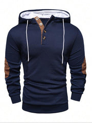 Sweat bleu marine à capuche et col boutonné, vue de face.