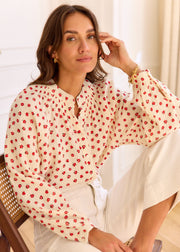 Blouse beige fleurie rouge