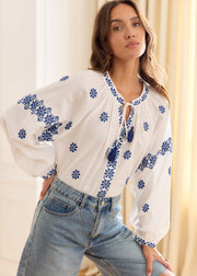 Blouse écrue motifs marine lien col