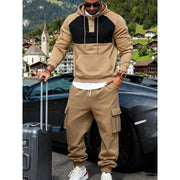 Ensemble sweat à capuche camel — vue portée de face, valise à la main