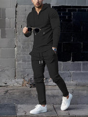 Ensemble sweat gaufré et pantalon noir — vue portée en marche