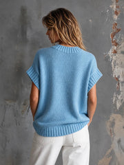 Pull bleu clair cœur rouge — vue portée de dos