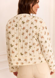 Veste matelassée beige à fleurs, vue portée de dos