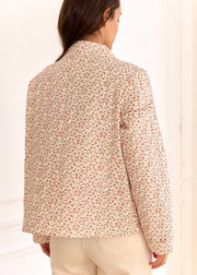 Veste blanche fleurie rose — vue portée de dos