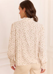 Chemise beige fleurie col volanté
