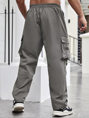 Pantalon cargo zippé gris, vue de profil