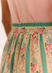 Pantalon vert rayé fleuri