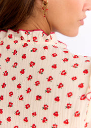 Chemise beige fleurie rouge