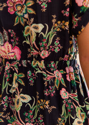 Robe noire fleurie rose vert boutonnée