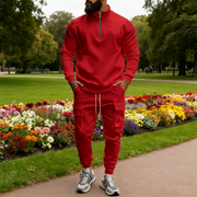 Ensemble col zippé cargo rouge — vue portée en pied, près de fleurs