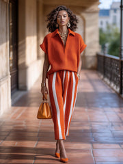 Ensemble maille orange et blanc — vue portée en marche, sur le balcon