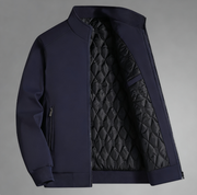 Veste bleu foncé ouverte sur un intérieur noir à losanges.