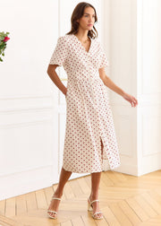 Robe crème à pois rouges