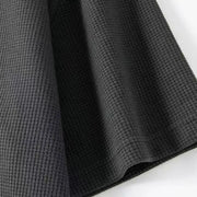 Ensemble sport gaufré — détail ourlet et côtes verticales du tissu