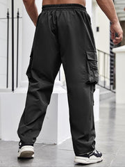 Pantalon cargo zippé noir, vue de profil