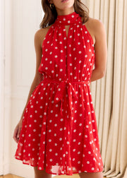 Robe rouge à pois blancs