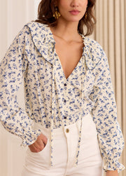 Blouse blanche fleurie bleue lien col