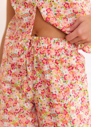 Pantalon ample rose fleuri en coton