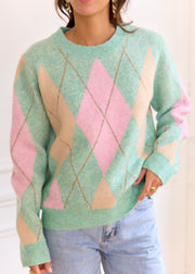 Pull vert rose Hugo — vue portée de trois-quarts, légèrement de côté