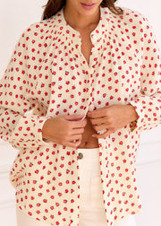 Blouse beige fleurie rouge