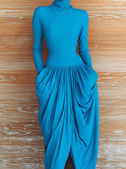 Ensemble bleu foncé jupe froncée — vue rapprochée de face, haut et ceinture de la jupe
