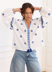 Blouse écrue motifs marine lien col