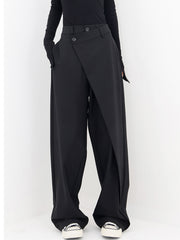 Pantalon ample à devant asymétrique noir, vue portée de face