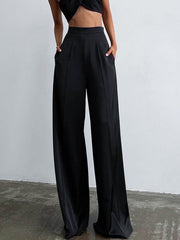 Pantalon ample en satin noir, vue portée de face