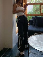 Pantalon de jogging à bandes noir, vue portée de profil