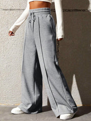 Pantalon de jogging large gris, vue portée, trois quarts