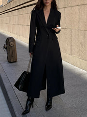 Manteau noir long à revers