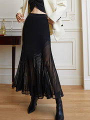 Jupe longue plissée tricot semi-transparente