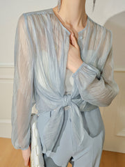 Blouse semi-transparente à manches longues